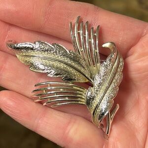 Vintage mid-century silver-tone stylized bird feathers brooch